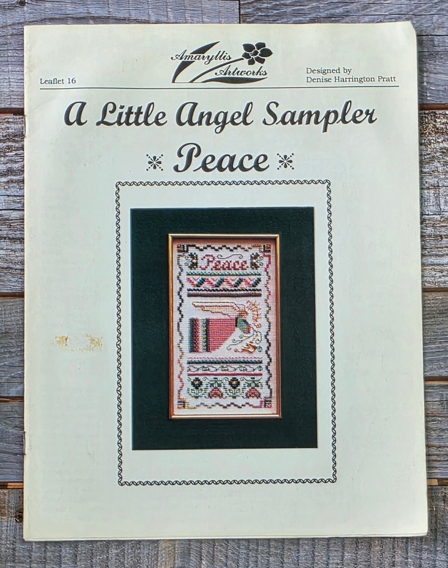 Amaryllis Artworks: A Little Angel Sampler Peace 16 Pattern