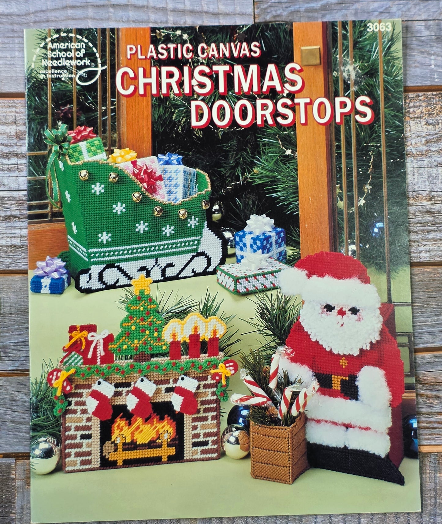 American School of Needlework: Plastic Canvas Christmas Doorstops Pattern #3063